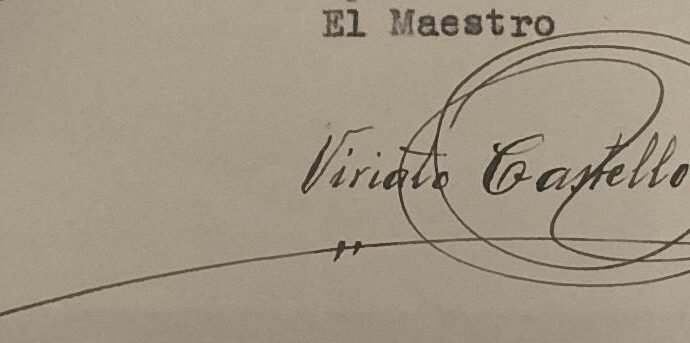 Firma del maestro.
